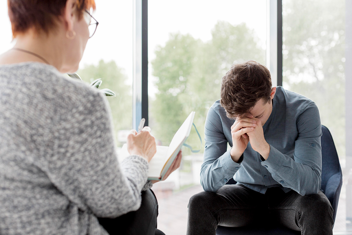 Bereaved counsellor providing emotional support to grieving client