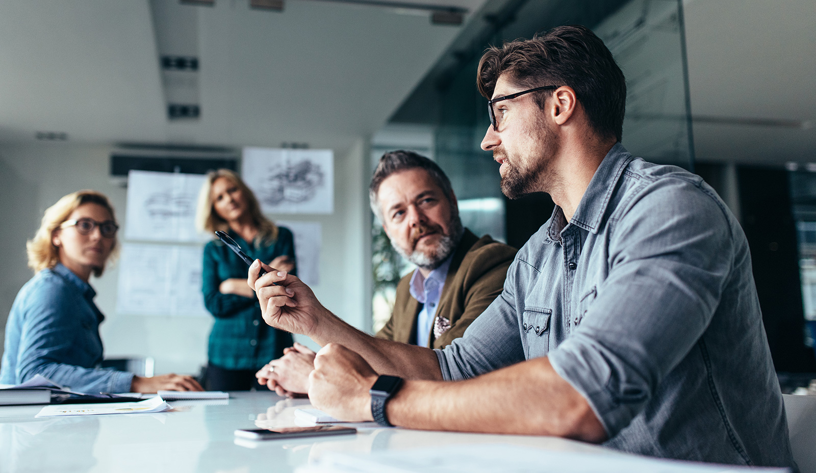 Employees learning resilience strategies in a workplace mental health workshop
